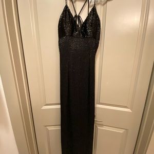 Black beaded full length ball gown with high slit